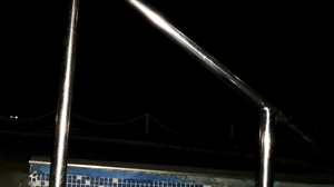 Be and Guy Cum on Railing at Night Poolside