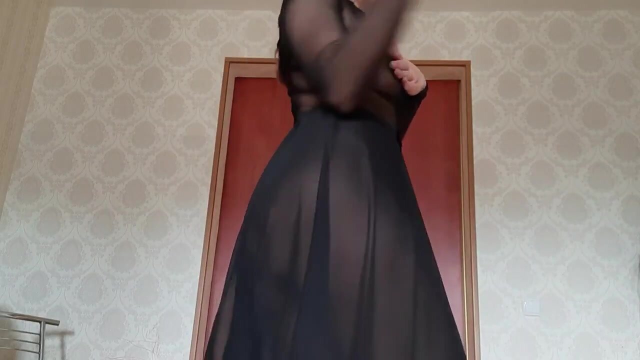 Russian beauty streams in see through dress and shows