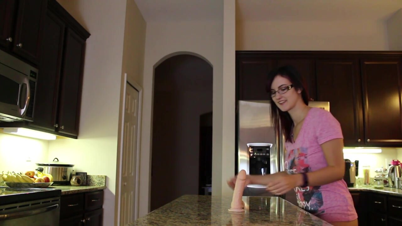 random naughty girl rides dildo in her kitchen