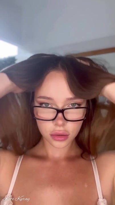 random hot girl in glasses plays with her dildo
